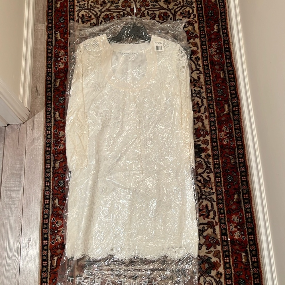 Trina truck white lace dress never worn